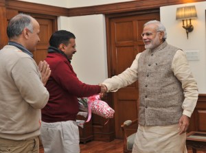 Delhi Chief Minister-designate Arvind Kejriwal,along with AAP MLA Manish Sisodia, calls on the Prime Minister Narendra Modi, in New Delhi on February 12, 2015.