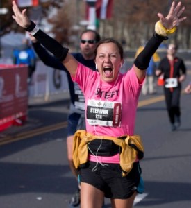 A runner rejoices at the 2014 Philadelphia Marathon. Source: City of Philadelphia-Priorities & Accomplishments Update