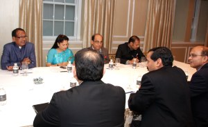 Chief Minister Shivraj Singh Chouhan and State Minister for Industry  Yashodhara Raje Scindia meeting investors in New York 