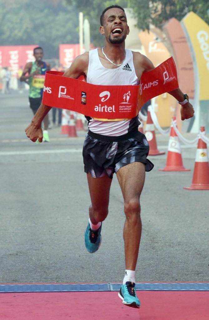 Defending champion Andamlak Belihu retains his men's title at the 15th Delhi Half Marathon, at Jawaharlal Nehru Stadium in New Delhi, Sunday, Oct. 20, 2019. Photo Piyal Bhattacharjee