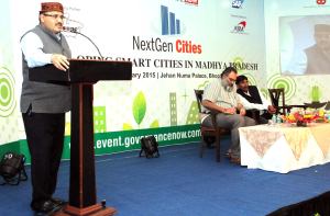 Madhya Pradesh Secretary IT Hariranjan Rao addressing the Digital MP Summit. Also seen are Professor Pushpenda Singh of Makhanlal Chaturvedi National University of Journalism and Communication and sarman Nagela, Director MPPost