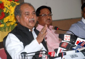 Union Minister for Mines and Steel Narendra Singh Tomar addressing a press conference to mark the completion of one year of the NDA government, in Bhopal on June 08, 2015. Minister of State for Mines and Steel Vishnu Deo Sai is also seen.
