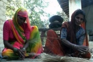 village women making ropes from forest produce
