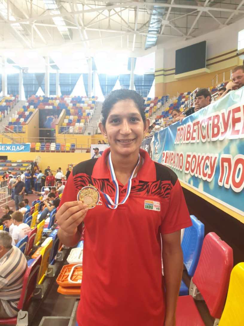 Neeraj with her gold medal