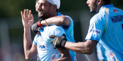 Mandeep Singh celebrates a goal with his teammates