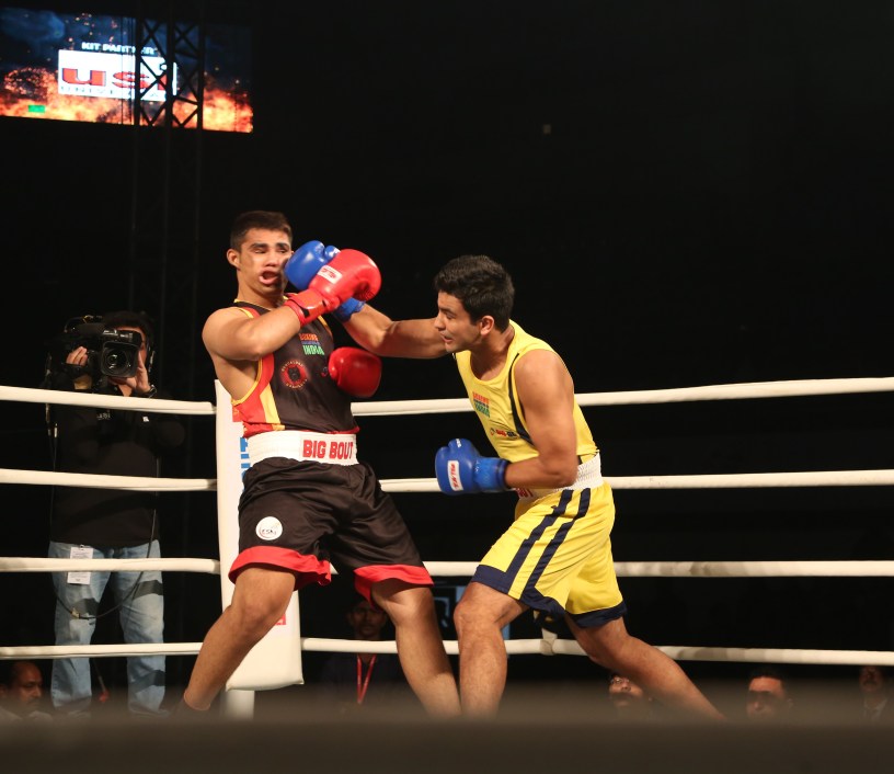 Odisha Warriors' Naman Tanwar (yellow) in action